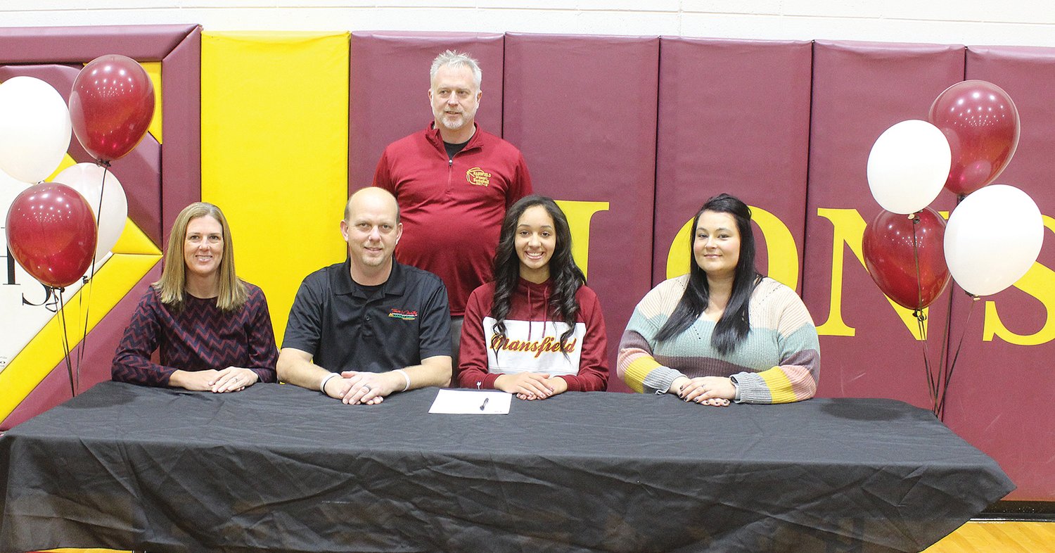 Front row, from left: College of the Ozarks head girls basketball coach Becky Mullis, Laynie Noble, Jada Henry and Ashley Noble. Back row: Mansfield girls basketball coach Dr. Gary Greene in 2021.